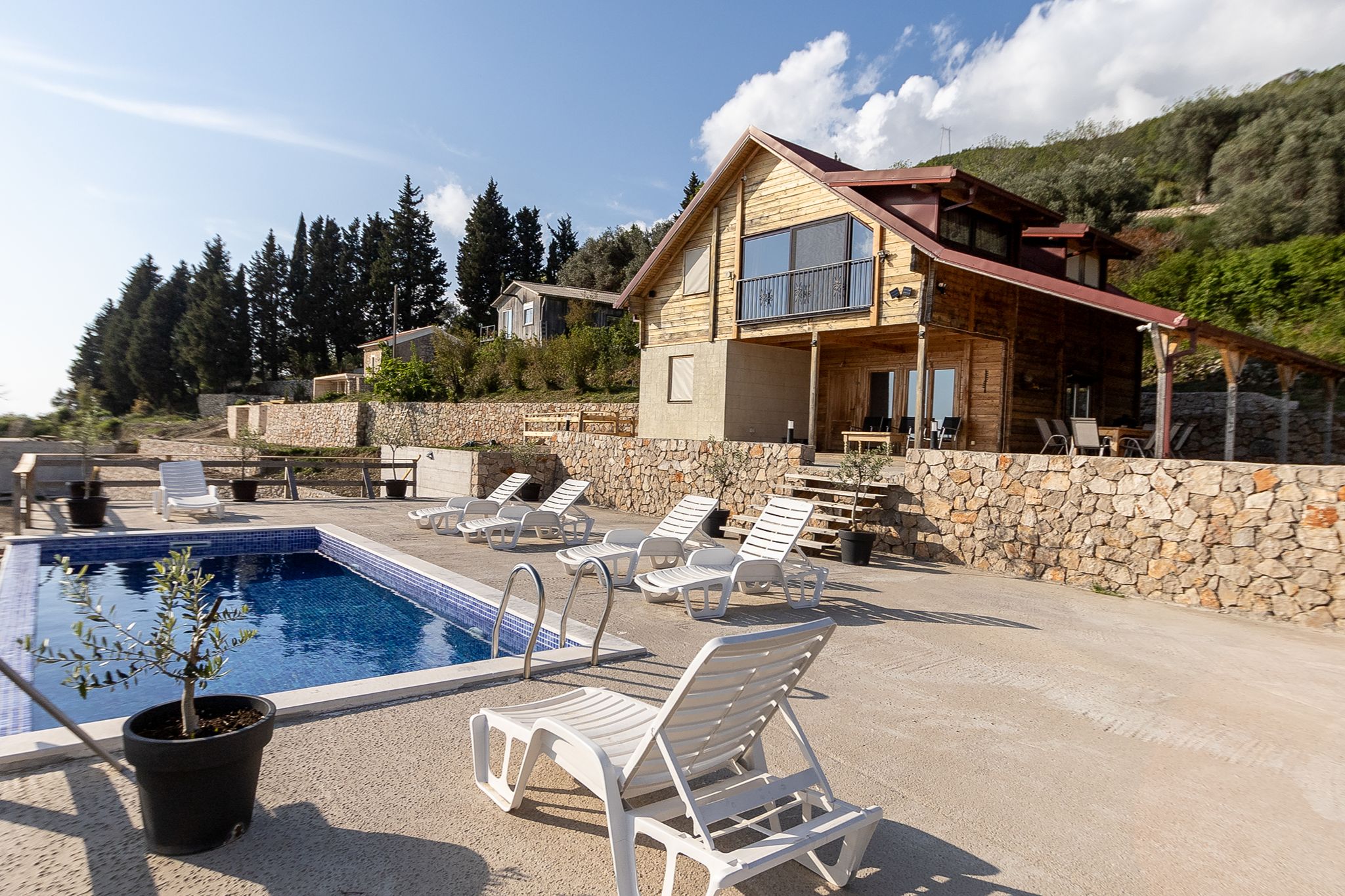 Villa and pool by day